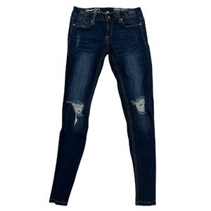 Stretchy dark wash distressed jeans